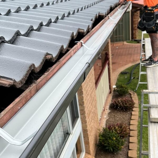 Expert gutter installation in Adelaide. Roofing Guys Adelaide installs new guttering on tiled roofs to improve water flow and help prevent costly water damage.
